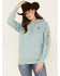 Image #1 - Ariat Women's Boot Barn Exclusive Cow Print Embroidered Logo Hoodie, Blue, hi-res